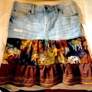 This custom embroidered skirt is 19” in length and the waist is 28”.